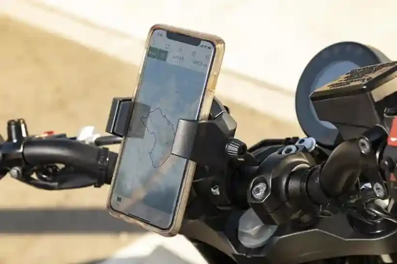 Best Motorcycle Phone Mounts 2026: Quad Lock vs. RAM & Vibration Tech