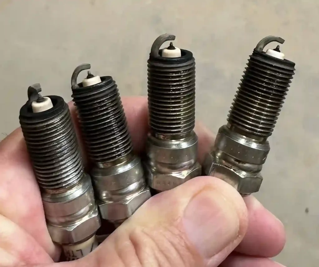 How much does it cost to replace spark plugs 11zon